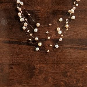 Floating pearl necklace